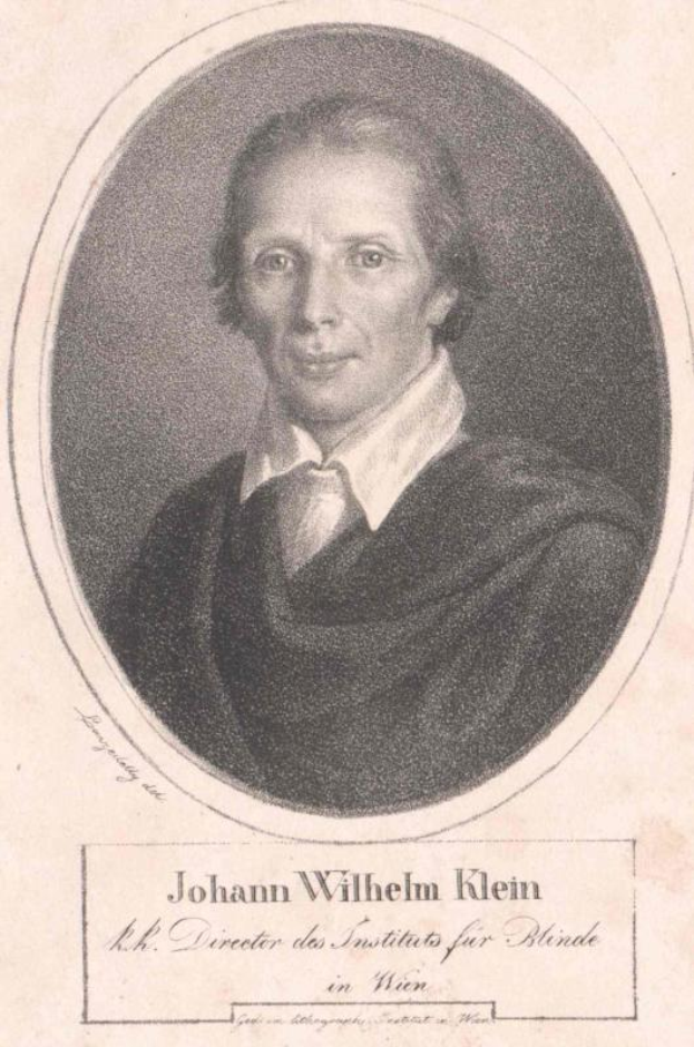 Schwarzes und weißes Porträt von Johann Wilhelm Klein, Direktor des Instituts für Blinde in Wien, der einen weißen Hemdkragen trägt und ernst schaut, mit deutschem Text unten.